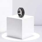 Bague anti-stress rotative à motif torsadé noir
