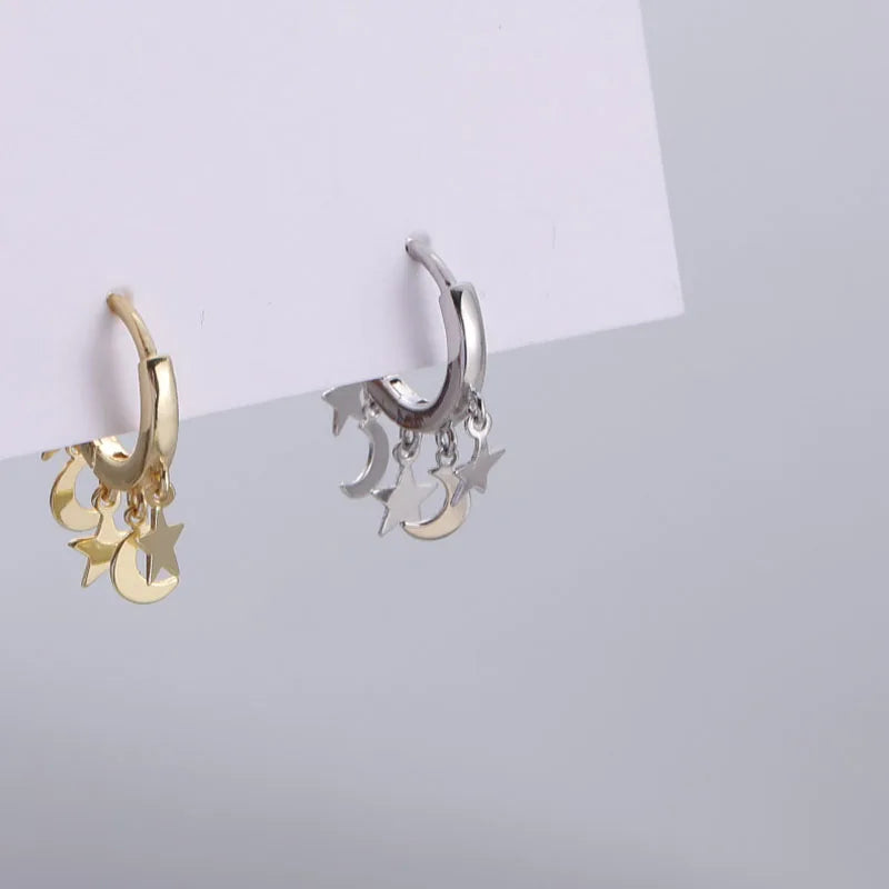 Σκουλαρίκια Κρίκοι με Κρεμαστά Αστέρια και Φεγγάρια ασημένια