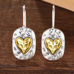 Boucles d'oreilles en cœur couleur argent et or