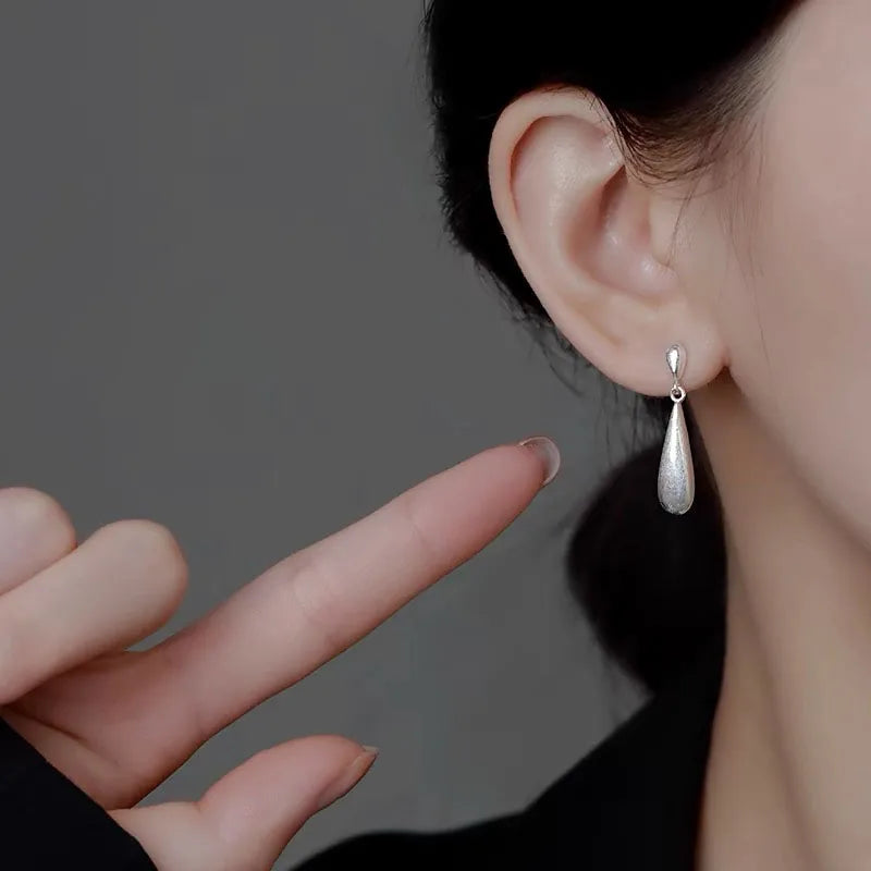 Σκουλαρίκια καρφάκια σταγόνα νερού με λευκό ζιρκόνιο 