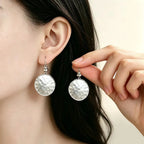 Boucles d'oreilles pendantes vintage en métal martelé