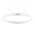Λεπτό και ρυθμιζόμενο βραζιλιάνικο βραχιόλι λευκό