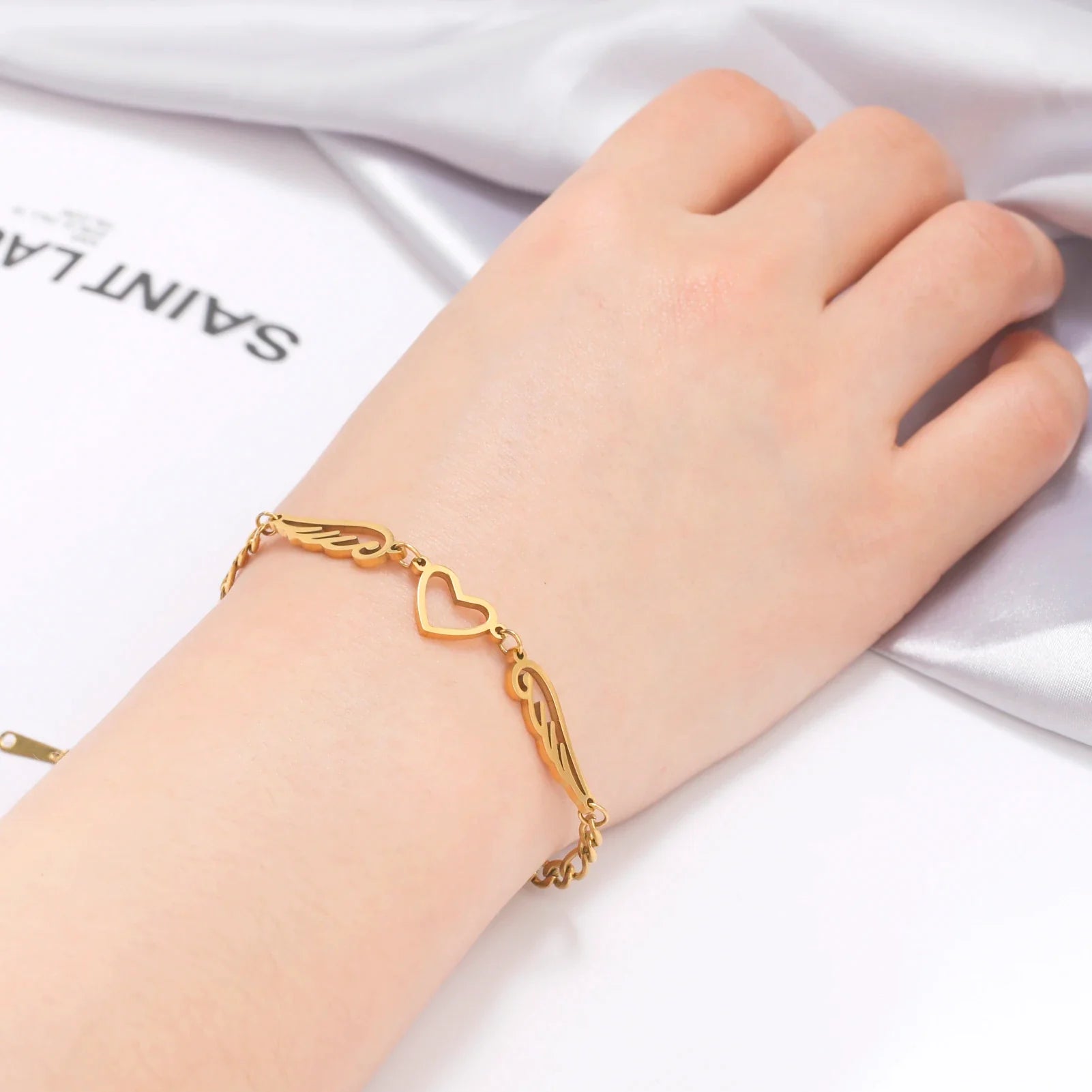 Βραχιόλι καρδιά και φτερά αγγέλου χρυσό