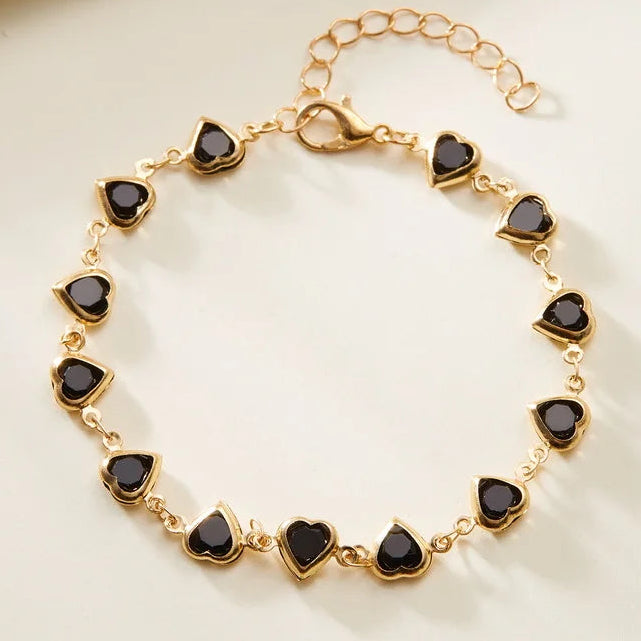 Βραχιόλι με καρδιές από σμάλτο χρυσό και μαύρο