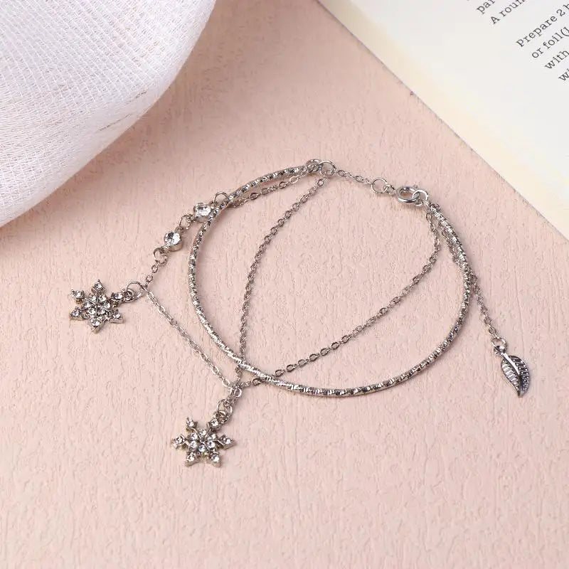 Διπλό βραχιόλι με κρυστάλλινες νιφάδες χιονιού