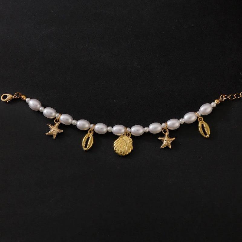 Βραχιόλι με χάντρες και κοχύλια