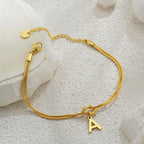 Βραχιόλι με αρχικό γράμμα και φιόγκο - γράμμα 