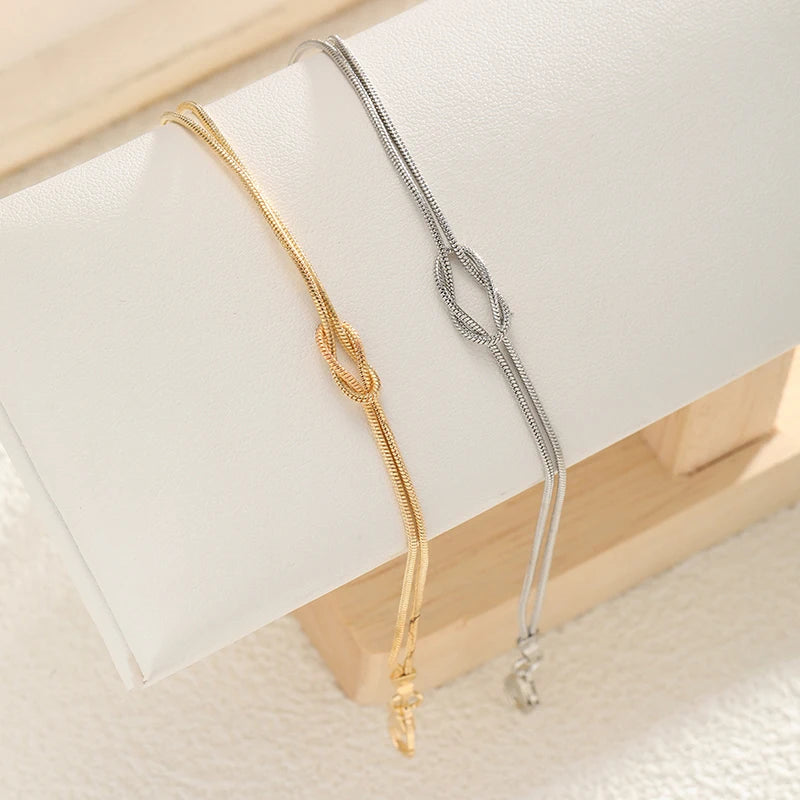 Βραχιόλι για Ζευγάρι με Δεμένο Κόμπο σε Χρυσό και Ασήμι (Σετ 2 Βραχιολιών)