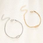 Βραχιόλι για Ζευγάρι με Δεμένο Κόμπο σε Χρυσό και Ασήμι (Σετ 2 Βραχιολιών)