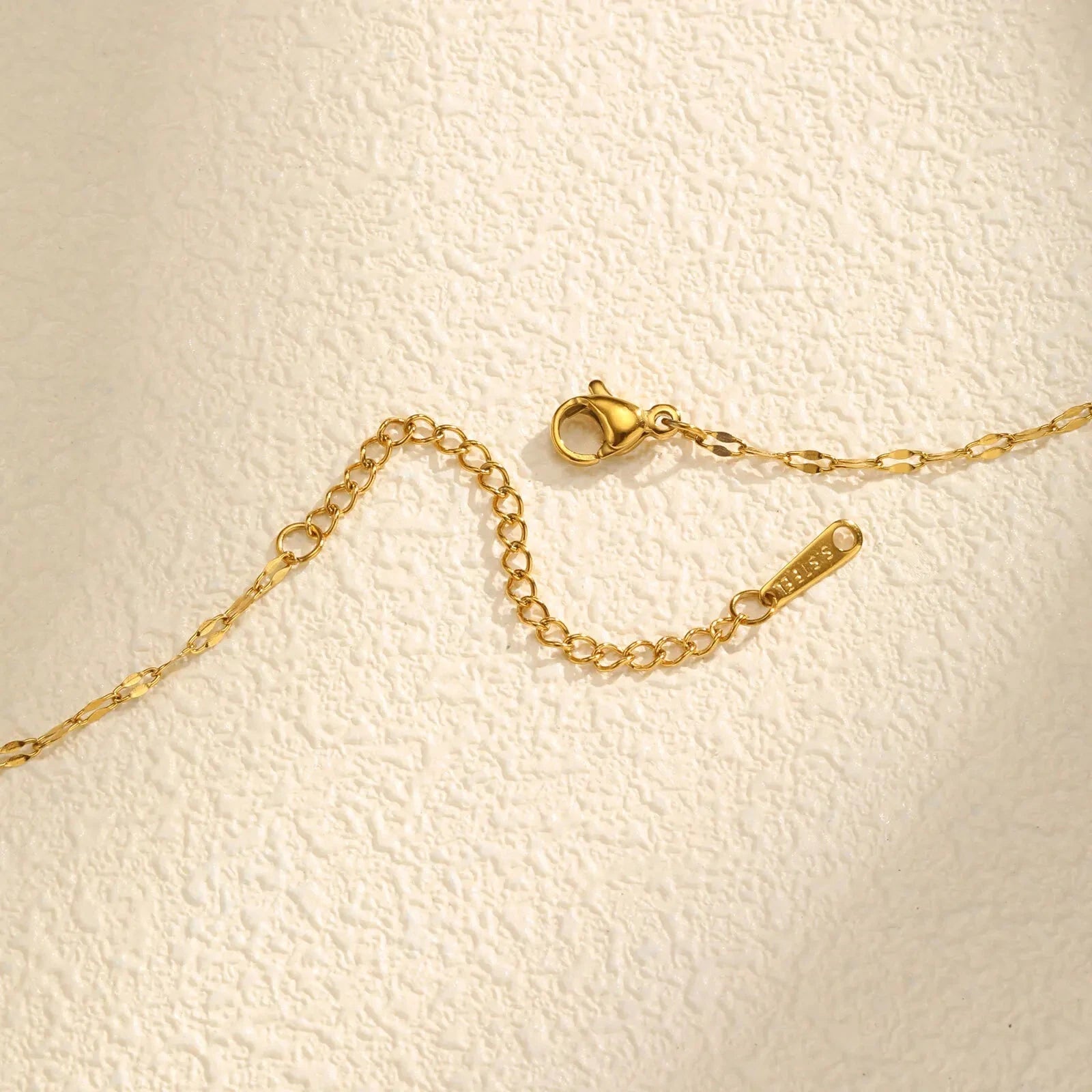 Κολιέ με Περιστρεφόμενο Κρεμαστό Λουλούδι από Ζιρκόνιο Αντιστρες