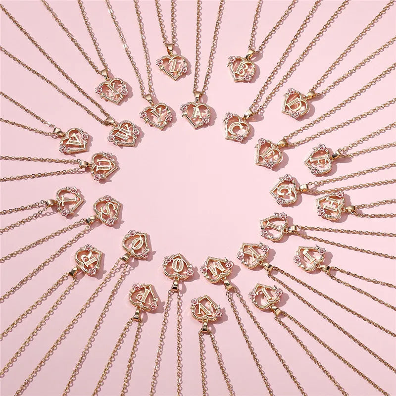 Κολιέ με μενταγιόν αρχικό καρδιά και λουλούδια