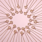 Κολιέ με μενταγιόν αρχικό καρδιά και λουλούδια