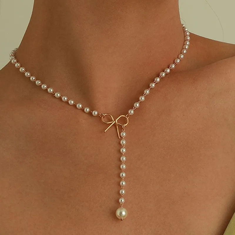 Collier de Perles avec Pendentif Noeud blanc