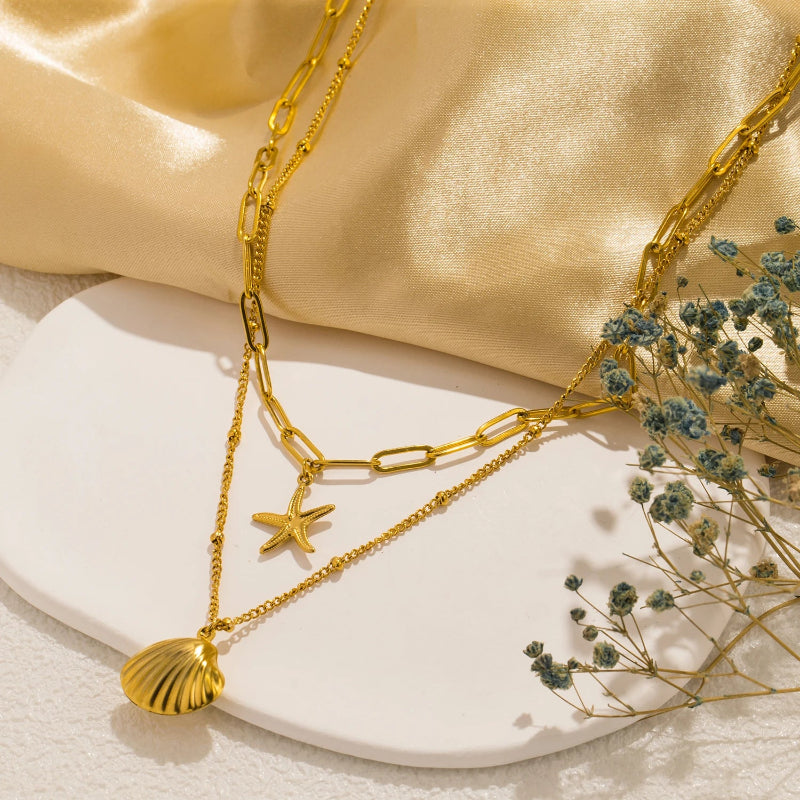 Κολιέ διπλής σειράς με μενταγιόν κοχύλια, κοχύλι Αγίου Ιακώβου και αστερία