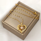 Κολιέ με μενταγιόν Καρδιά και Περιστρεφόμενο Λουλούδι κατά του Στρες