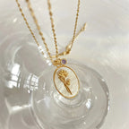 Κολιέ με μενταγιόν λουλούδι, ζώδιο