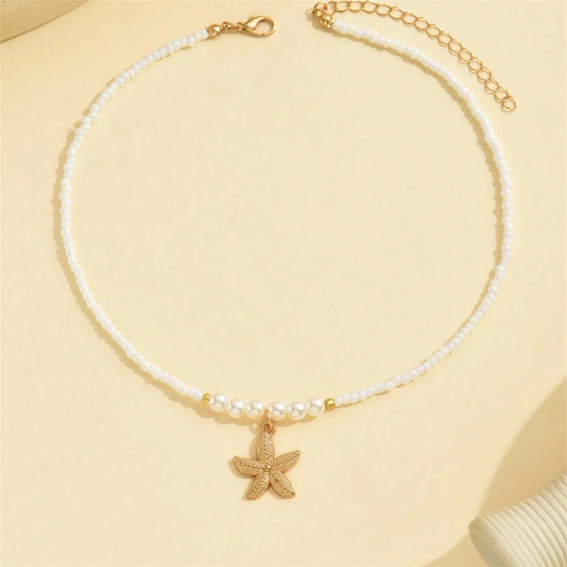 Κολιέ κοντό με μενταγιόν κοχύλι αστερίας