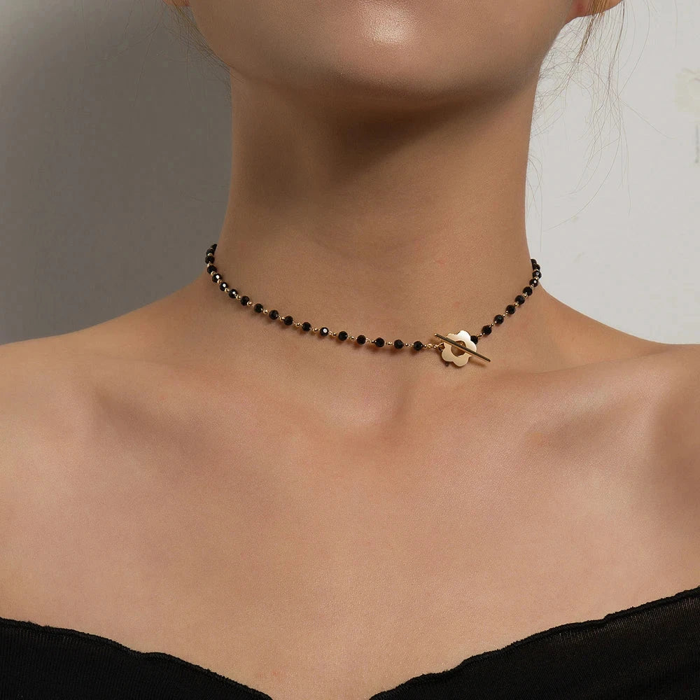 Κολιέ Choker με μενταγιόν μαύρο και χρυσό λουλούδι