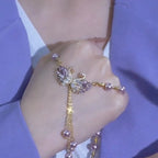 Collier violet à deux cygnes en forme de cœur