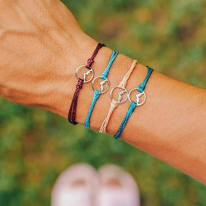 Σετ με 4 βραχιόλια από σχοινί με στρογγυλό μενταγιόν βουνού